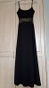 Pārdodu satriecoši skaistu vakara kleitu (garums no pleca līdz apakšai ~135 cm) melnas krāsas (Slalus Collection – made in USA). Praktiski jauna ...